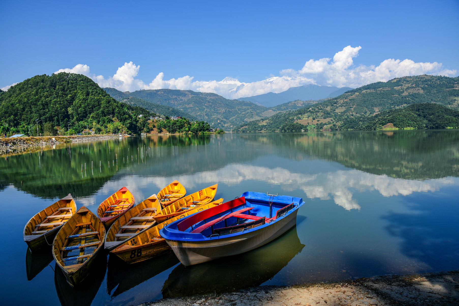 Boats on the Begnas Lake in Pokhara, Nepal