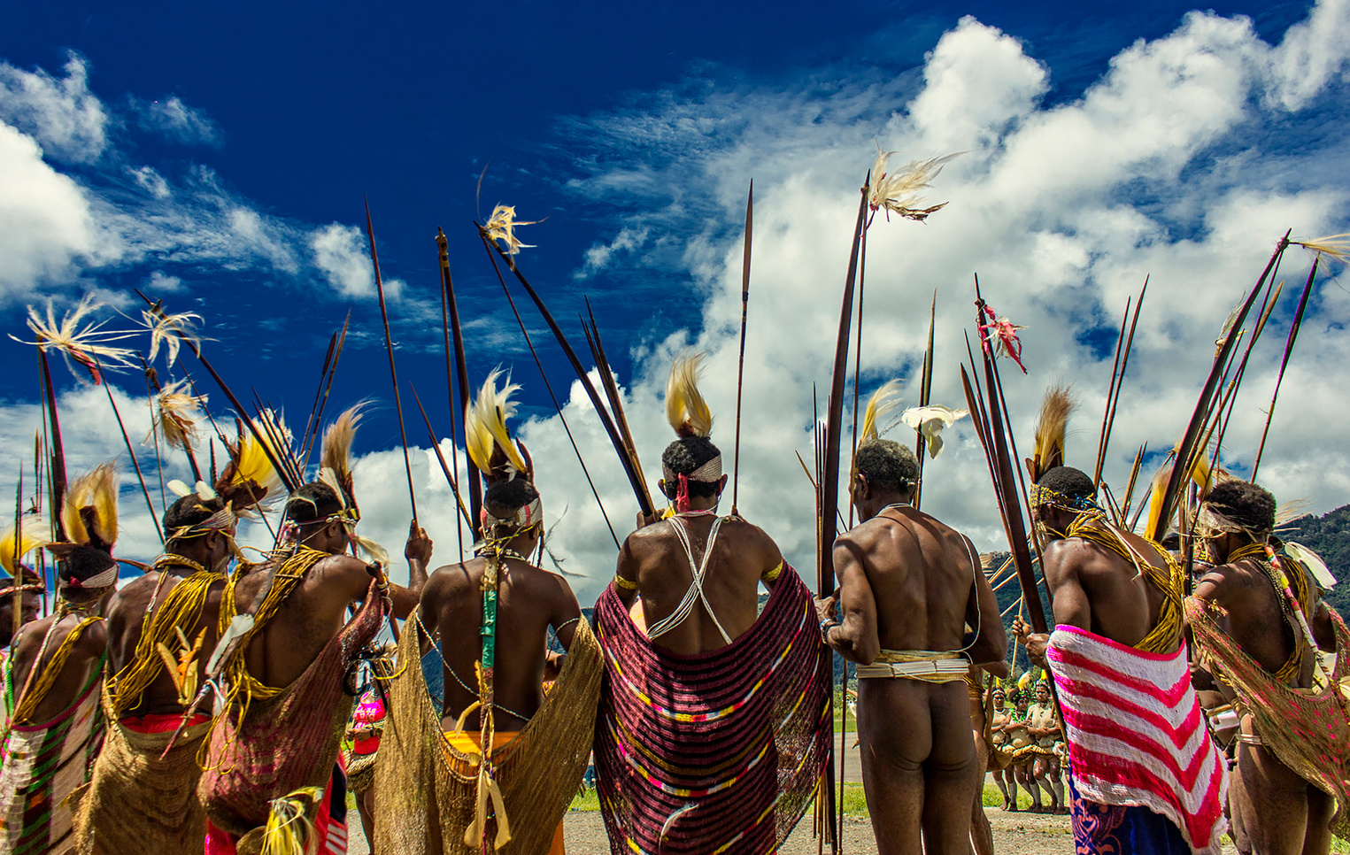 Men Wearing Tribal Costumes during Day